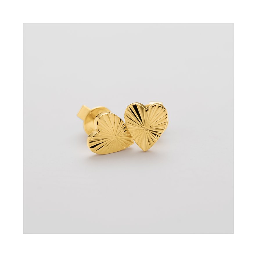 Guido Maria Kretschmer Ohrschmuck aus vergoldetem Silber. Zwei goldfarbene strukturierte Herzen nebeneinander.