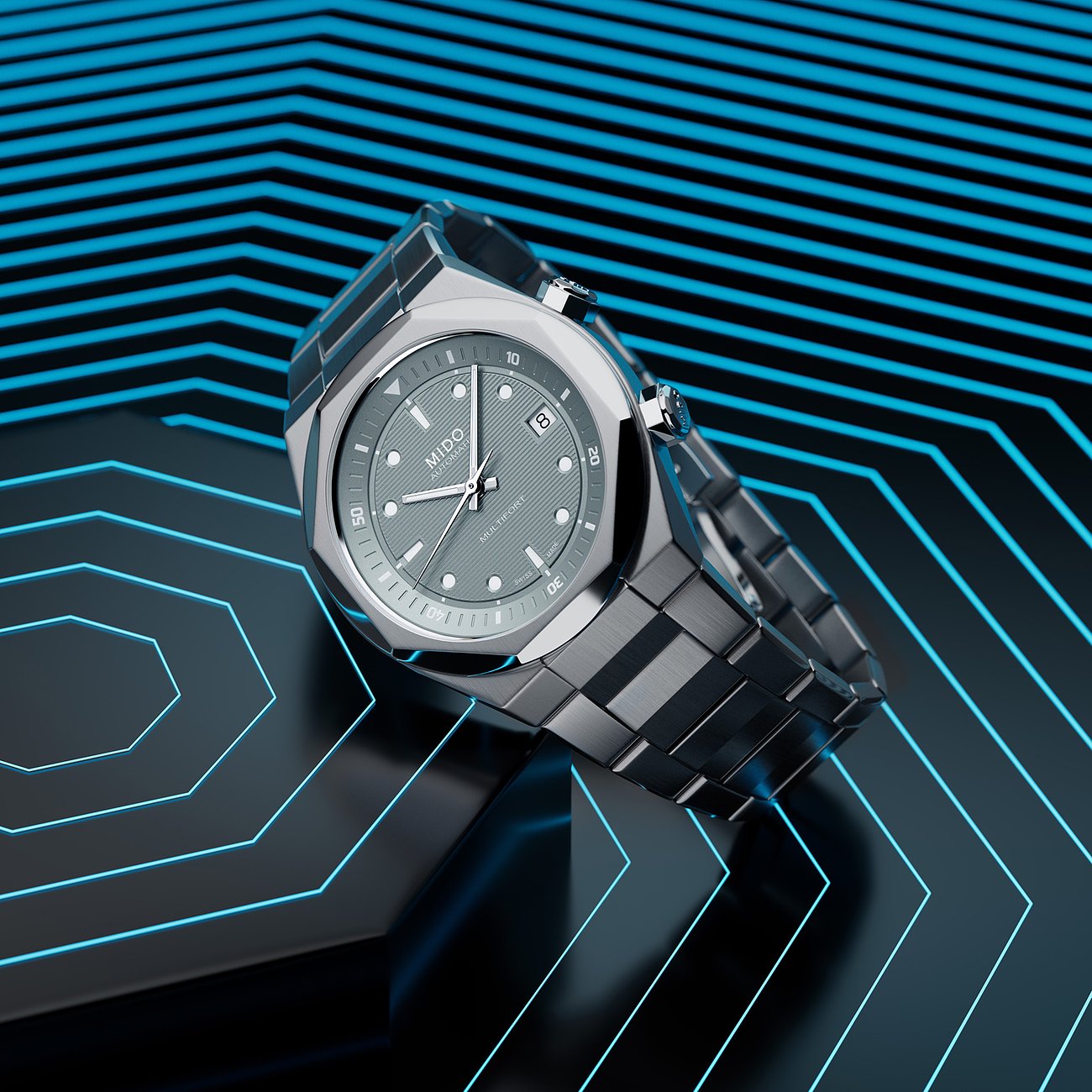 Mido Herrenuhr mit Edelstahlgehäuse und grauem Zifferblatt, analog.