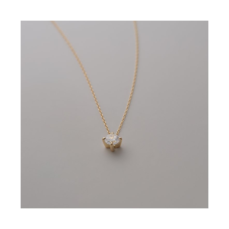 CHRIST Halsschmuck aus 585er Gelbgold mit einem runden Diamanten in einer Krappenfassung.