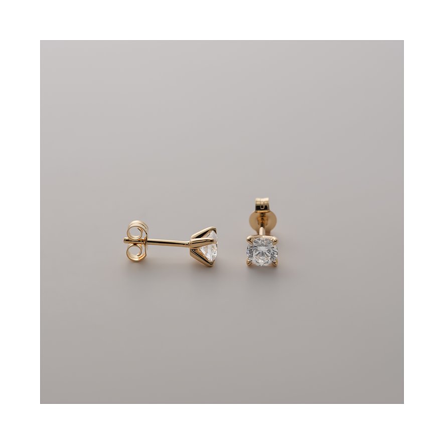 CHRIST 585er Gelbgold Ohrstecker mit funkelnden runden Diamant Steinen, einer frontal und der andere seitlich liegend.