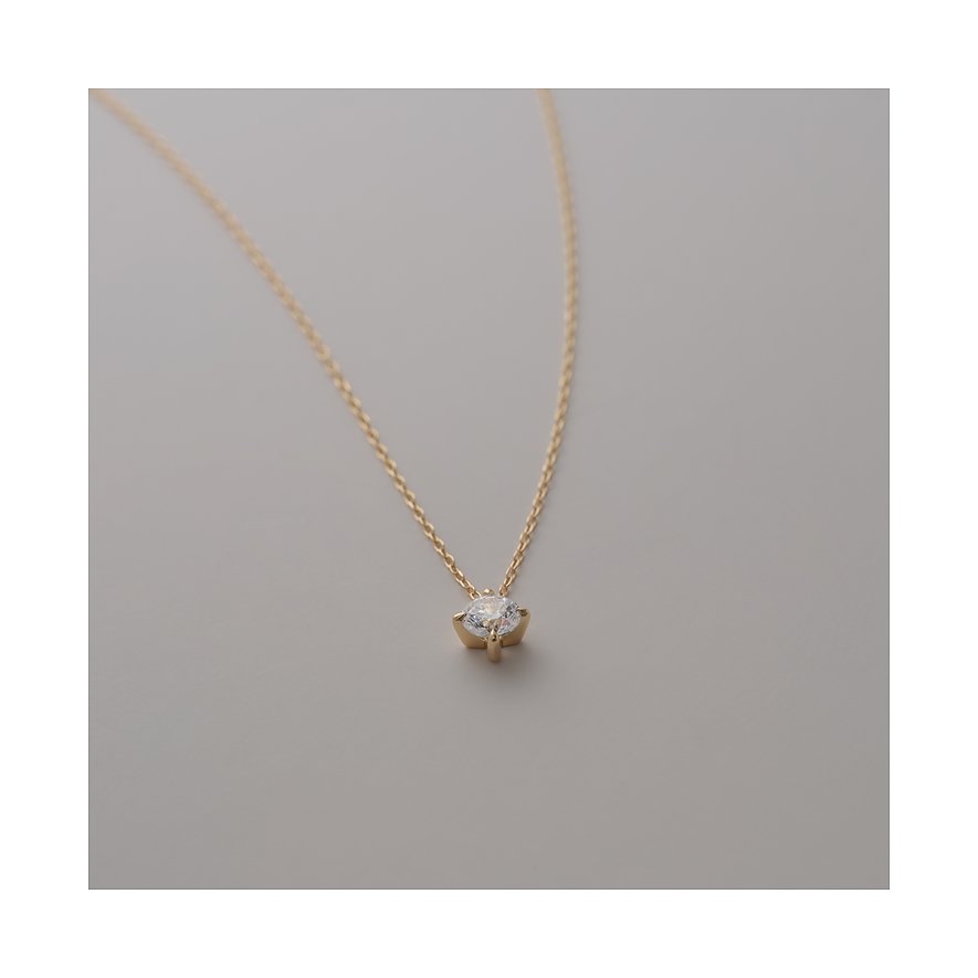 CHRIST Halsschmuck aus Gelbgold 585 mit einem runden Diamanten in einer Krappenfassung.