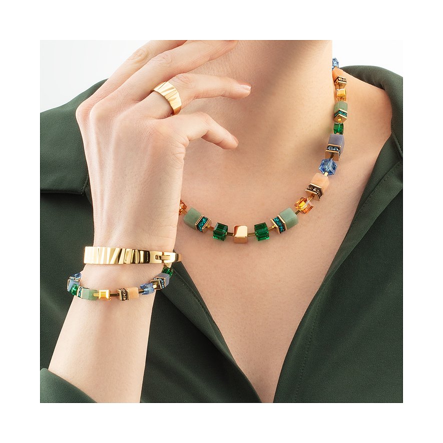 Bracelet Coeur de Lion en acier inoxydable avec pierres colorées et éléments dorés.