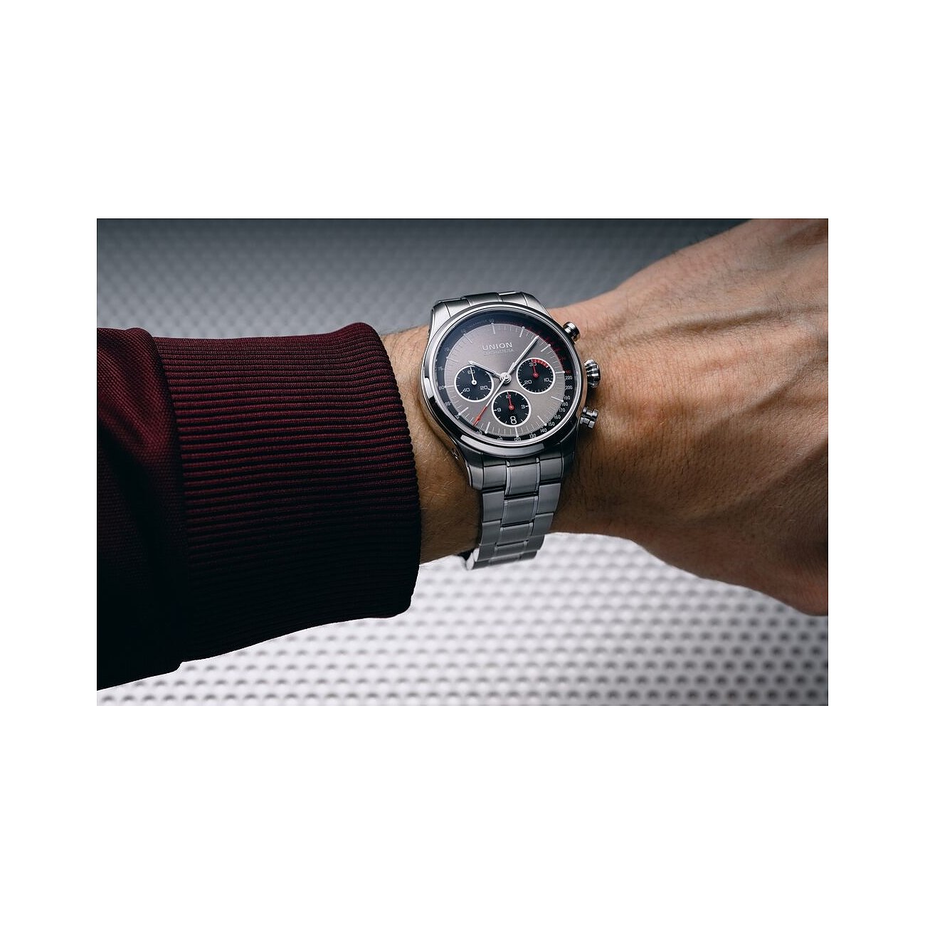 Union Glashütte Herrenuhr mit Edelstahlgehäuse, analog, Chronograph, grauem Zifferblatt.