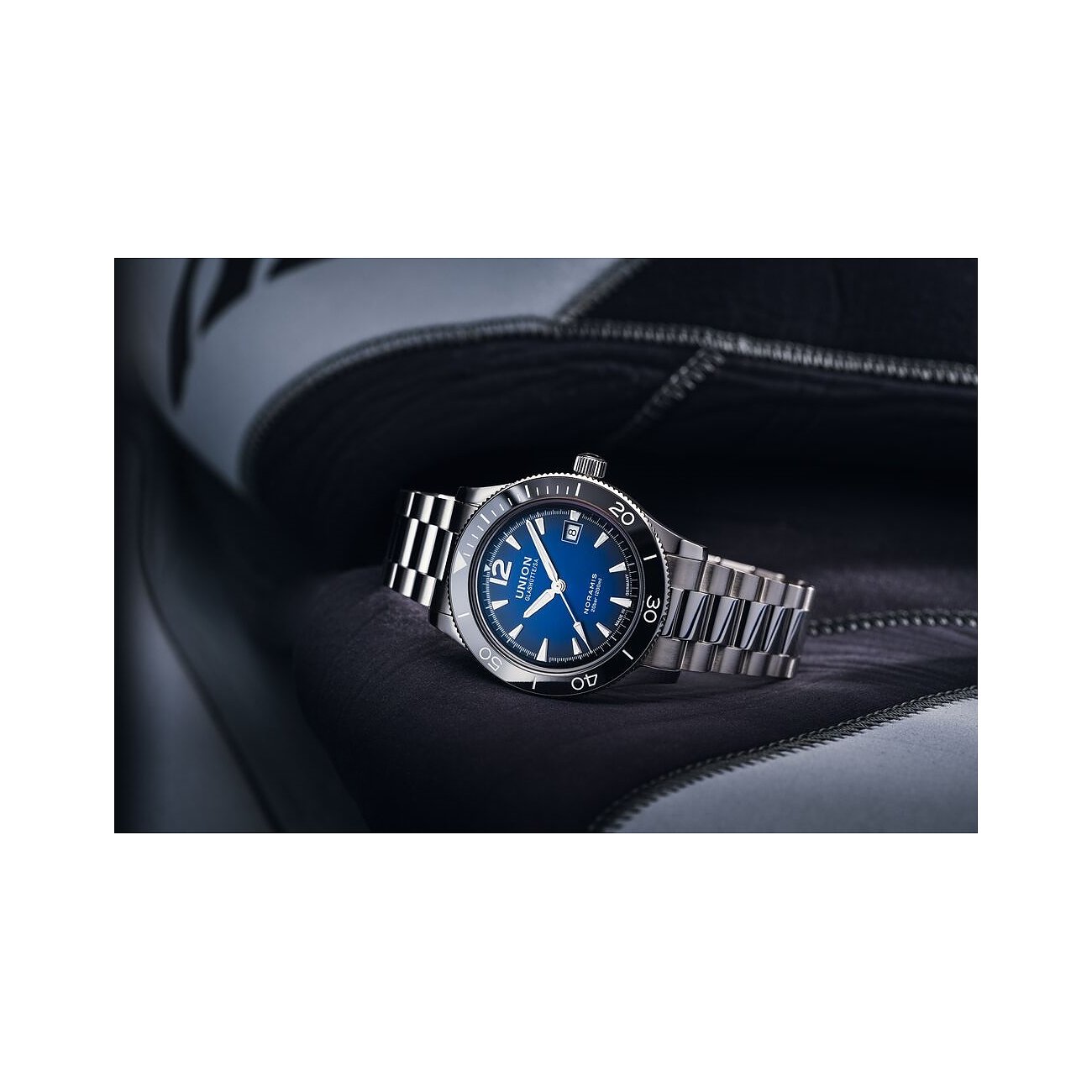 Union Glashütte Herrenuhr mit Edelstahlgehäuse, blauem Zifferblatt und Keramiklünette.