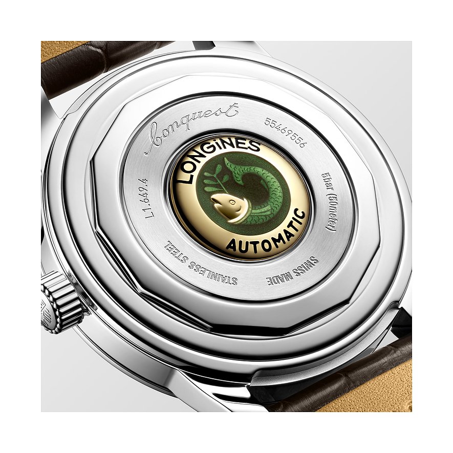 Rückseite einer Longines Herrenuhr aus Edelstahl mit „Longines Automatic“-Inschrift und Fisch-Emblemdetails.