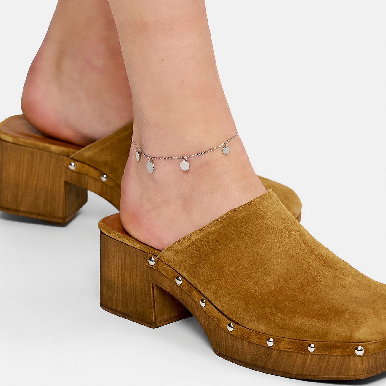 Liebeskind fotlänk i rostfritt stål med runda hängen.