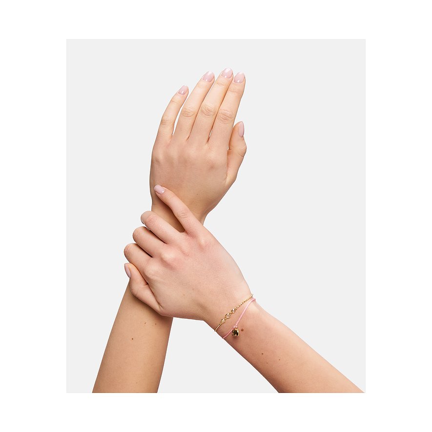 Tamaris Armband aus Edelstahl mit goldenem Elefantenanhänger und rosa Band.