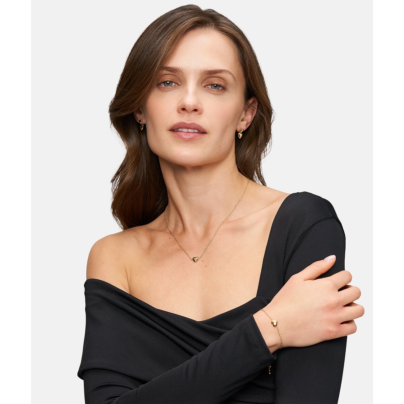 Tamaris Ohrstecker aus Edelstahl mit Herz-Anhänger, goldfarben.