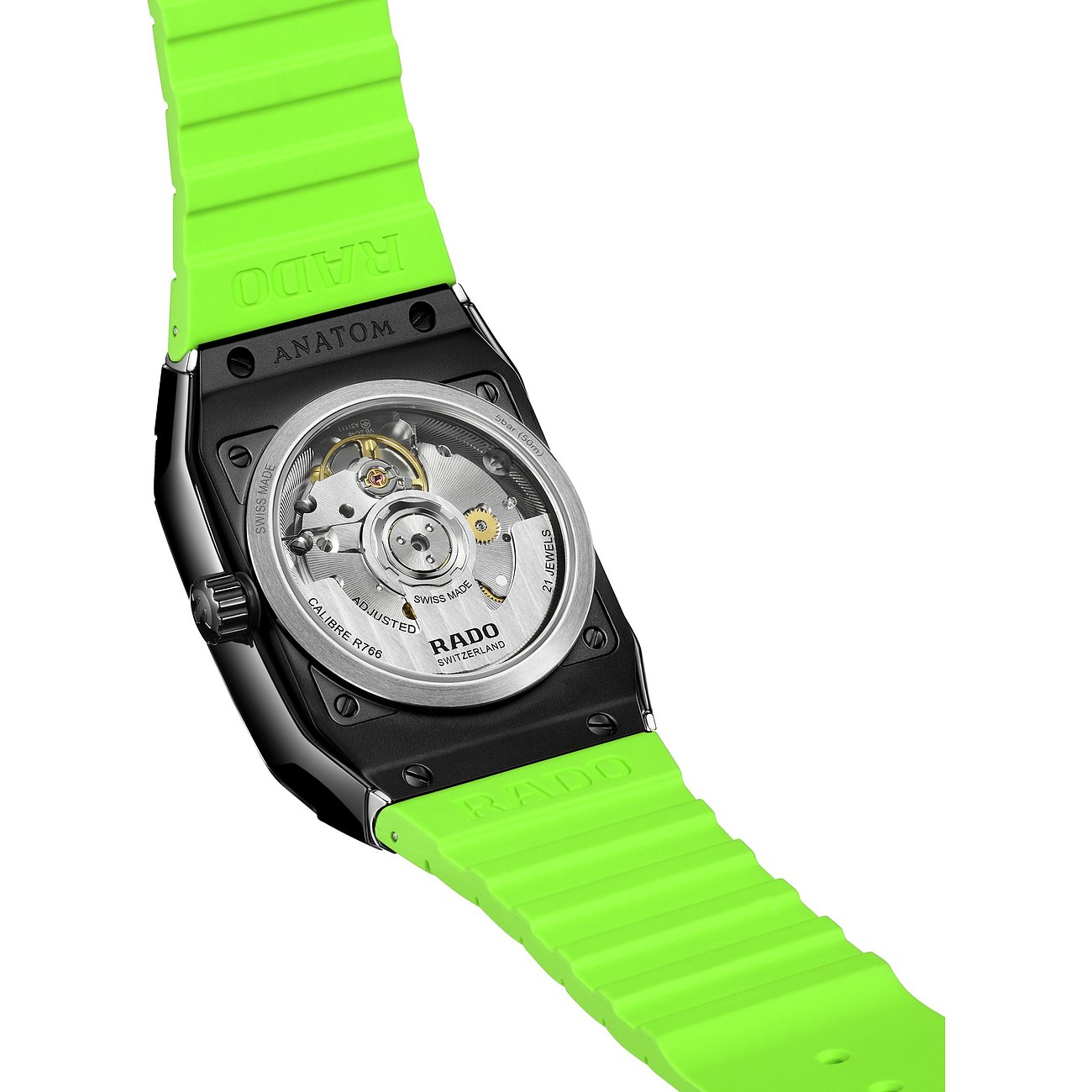 Rado Unisexuhr aus Keramik mit schwarzem Gehäuse und leuchtend grünem Armband, Rückansicht zeigt das mechanische Uhrwerk.