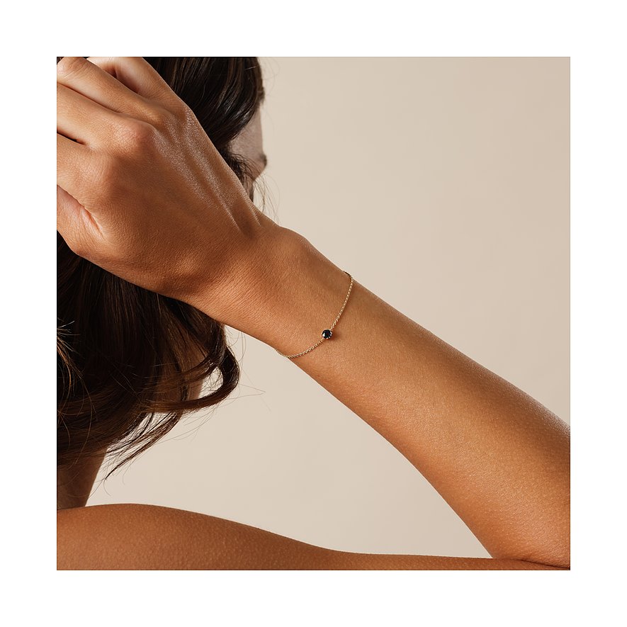 CHRIST armband i 375 gult guld med blå topas.