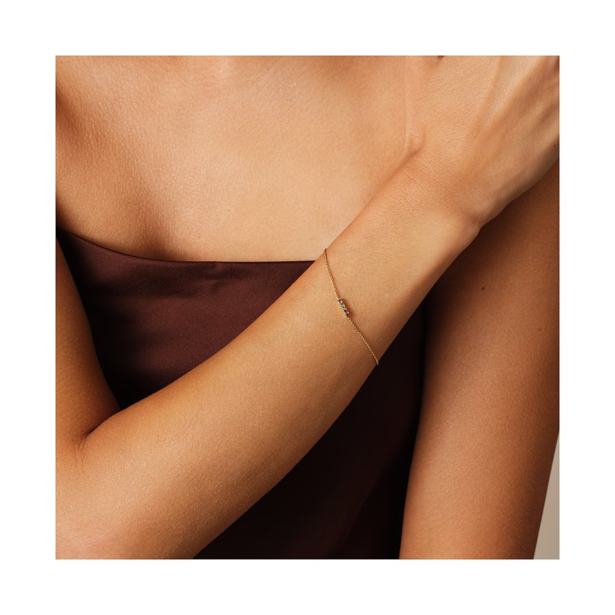 CHRIST Armband aus 375 Gelbgold mit Turmalin und weißen Steinen.