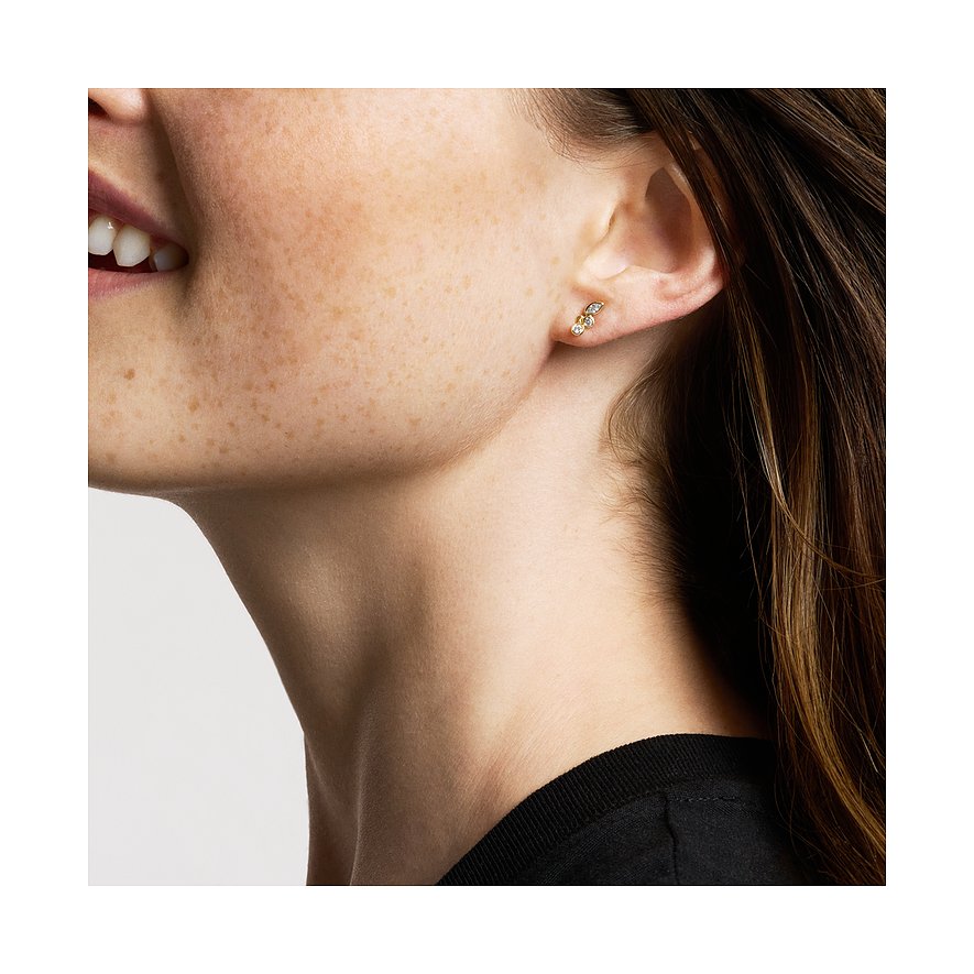 Fossil Ohrstecker aus Metall mit Glassteinen.