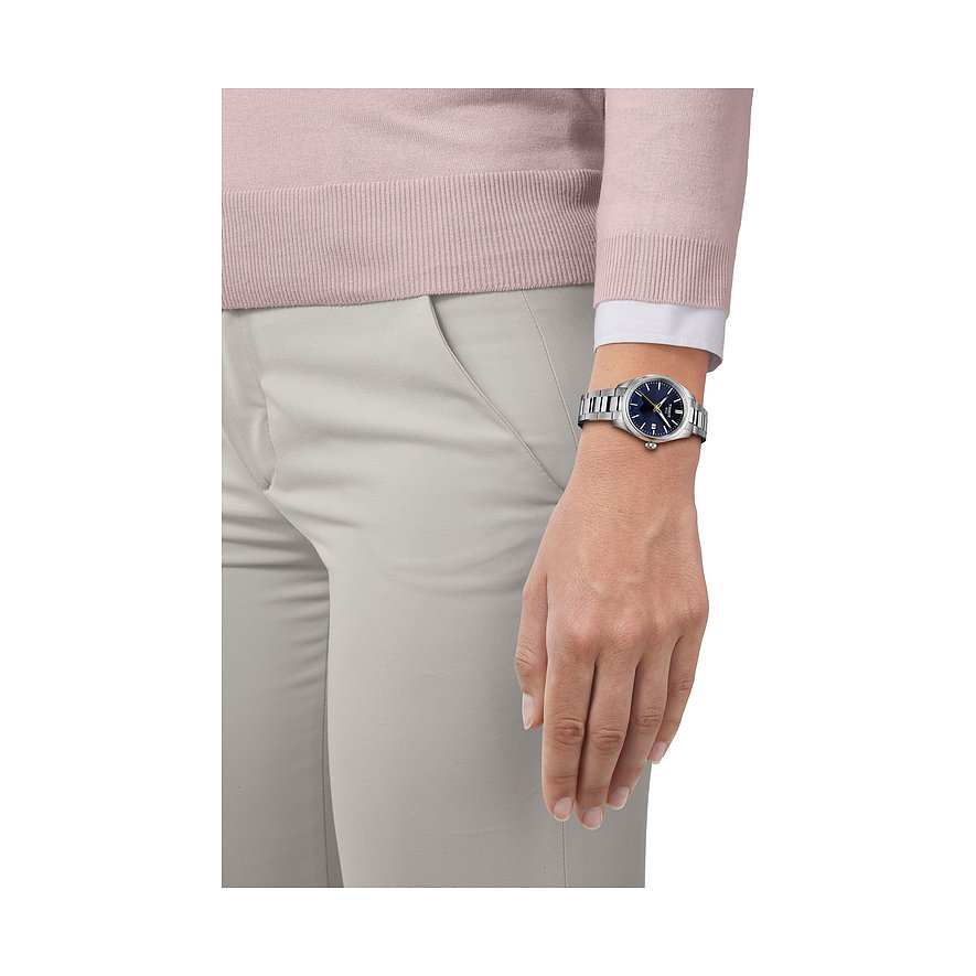 Tissot Unisexuhr mit Edelstahlgehäuse und blauem Zifferblatt.