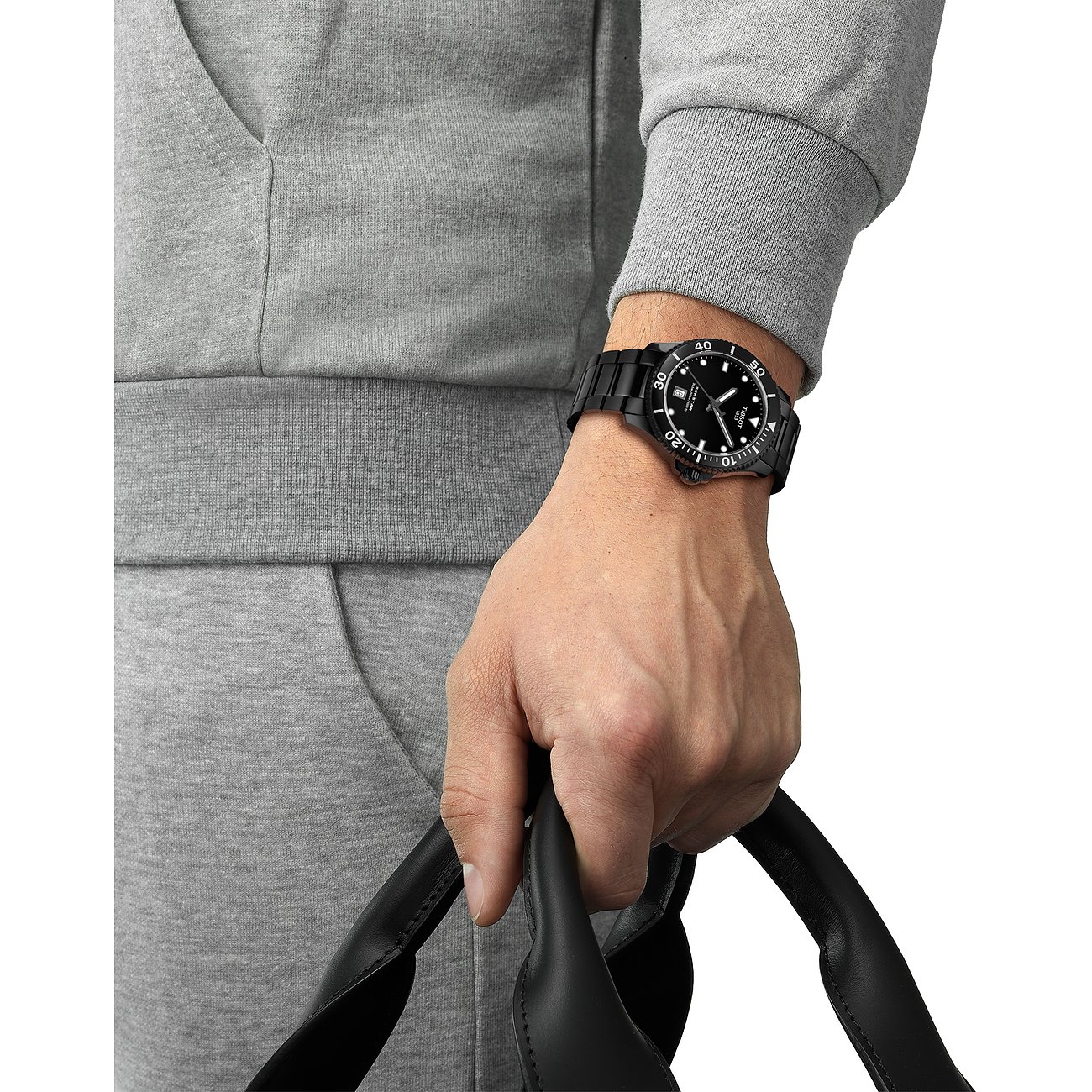Tissot Unisexuhr mit Edelstahlgehäuse, schwarzes Zifferblatt, analoge Anzeige.