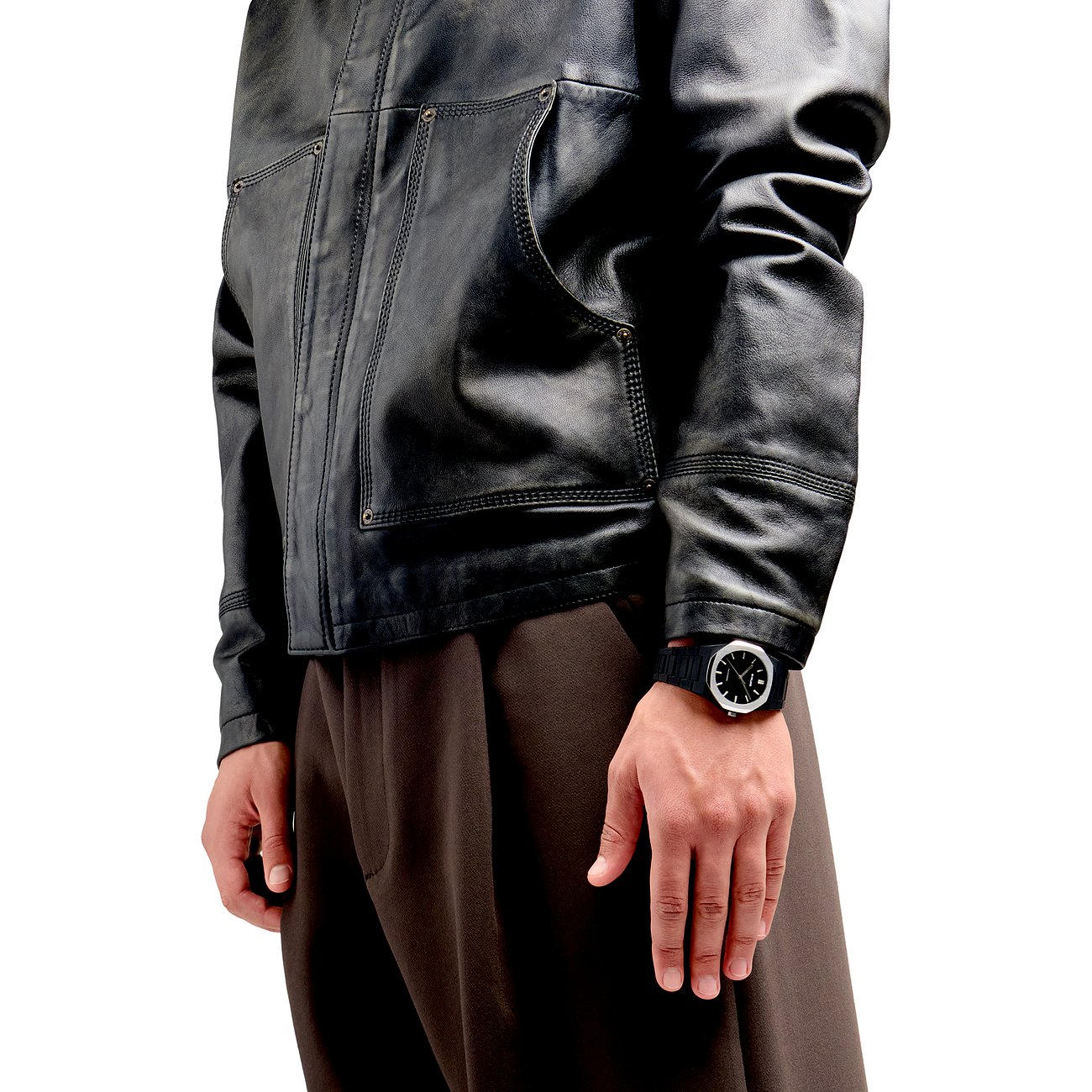 Montre unisexe D1 Milano avec boîtier en polycarbonate noir et affichage analogique.