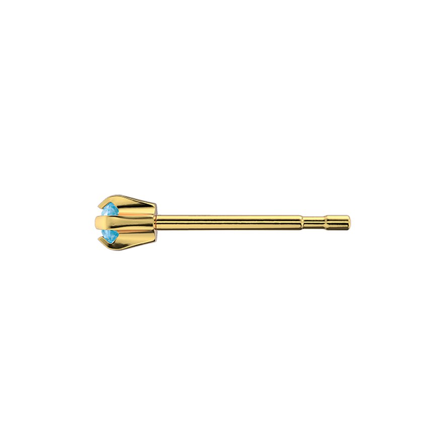 Studex Ohrstecker aus goldfarbenem Chirurgenstahl mit vier Krappen, die einen runden, hellblauen Schmuckstein halten.