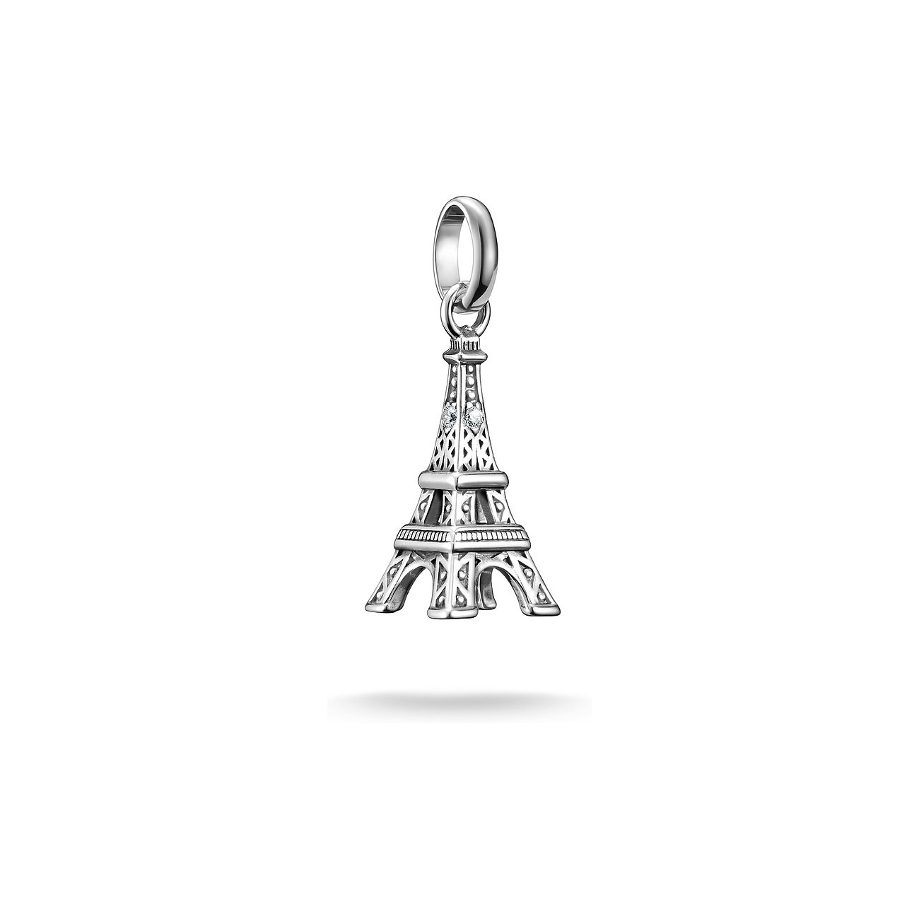 Thomas Sabo Charmanhæng Eiffeltårn af genanvendt 925 sølv med zirconia-sten, set fra oven.