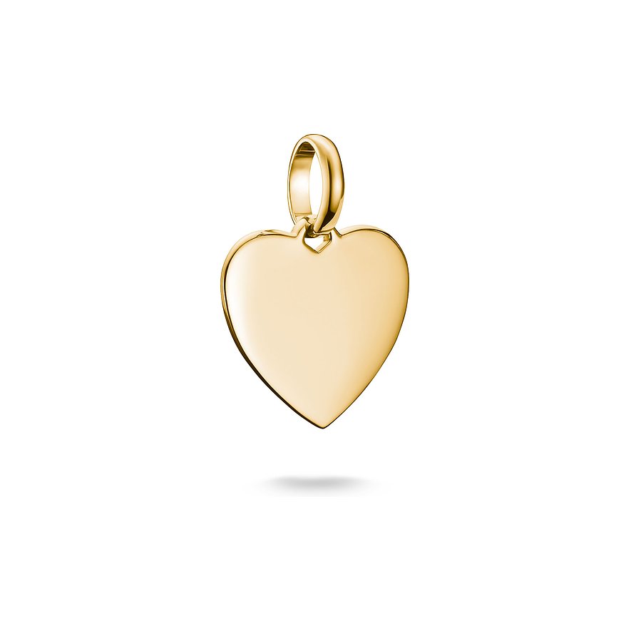 Ein glänzendes, herzförmiges goldenes Thomas Sabo Anhänger aus recyceltem Silber, das schimmert.