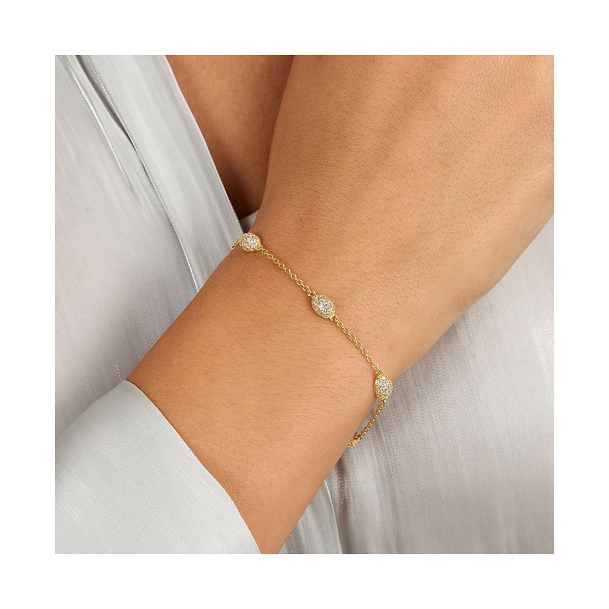 Bracelet Morellato doré en argent recyclé avec des éléments ronds sertis de zircone au poignet.