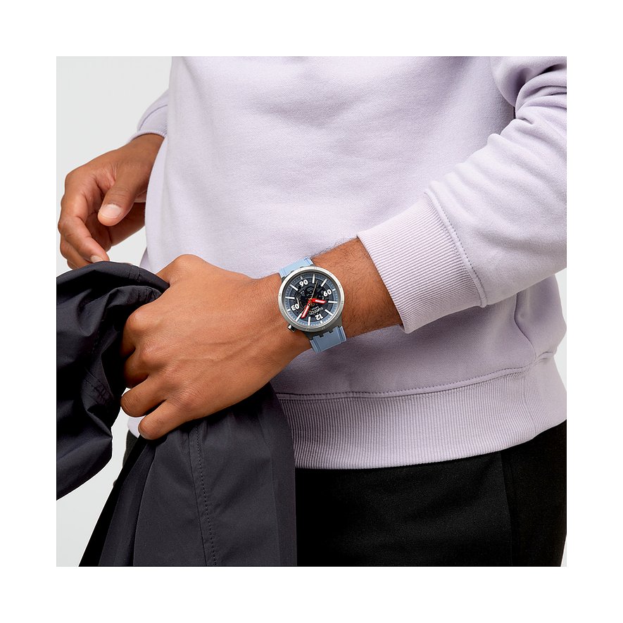 Swatch Unisexklocka med boett i rostfritt stål, blått armband och analog display.