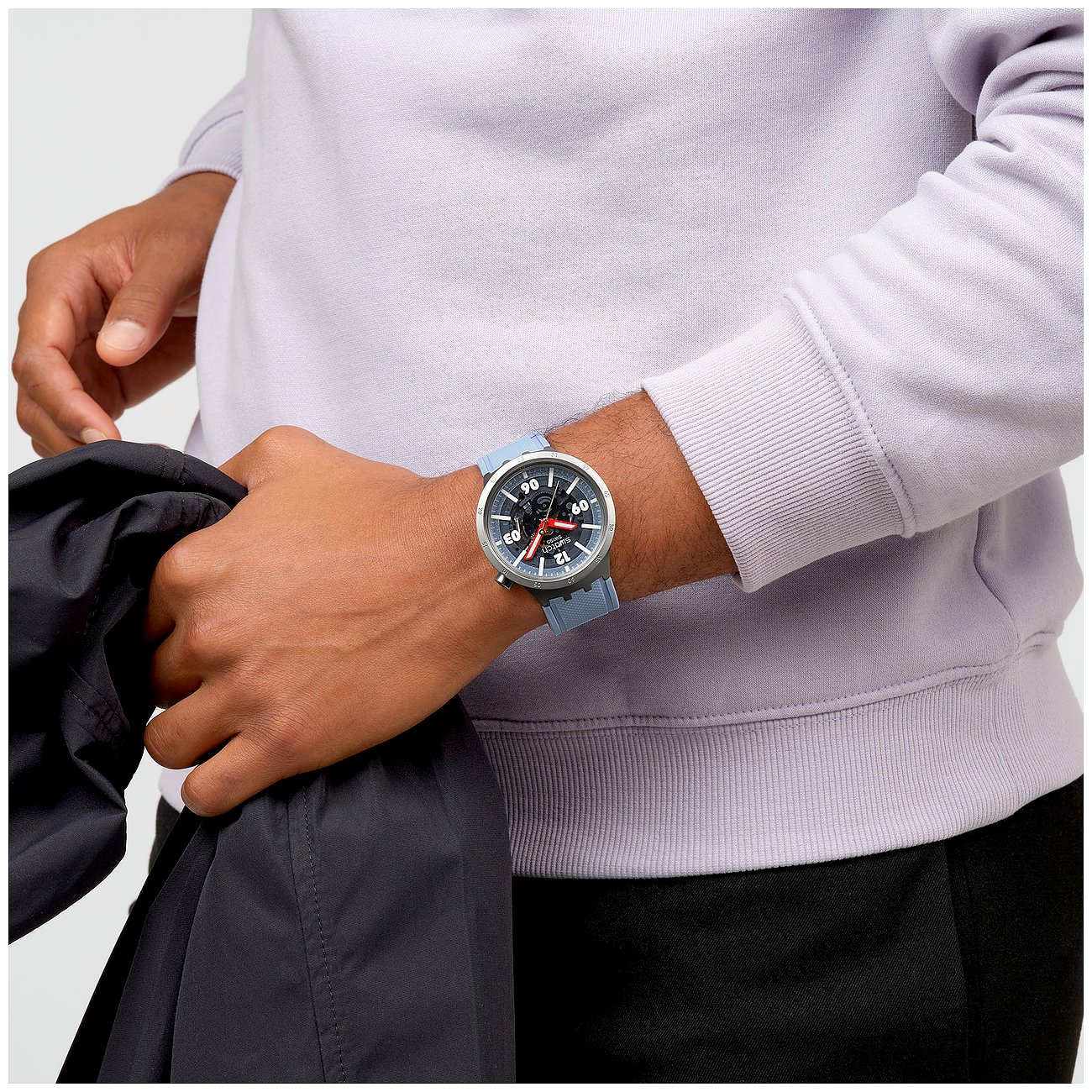 Swatch Unisexklocka med boett i rostfritt stål, blått armband och analog display.