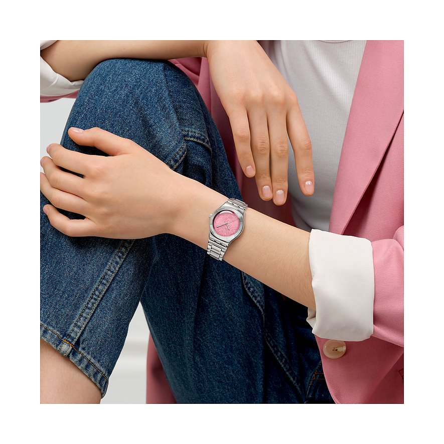 Swatch Damenuhr mit Edelstahlgehäuse und pinkem Zifferblatt.