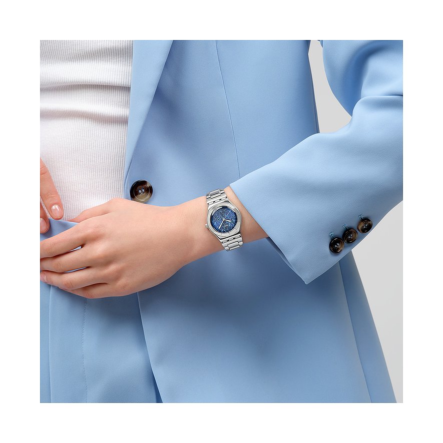 Swatch Damenuhr mit Edelstahlgehäuse und blauem Zifferblatt.