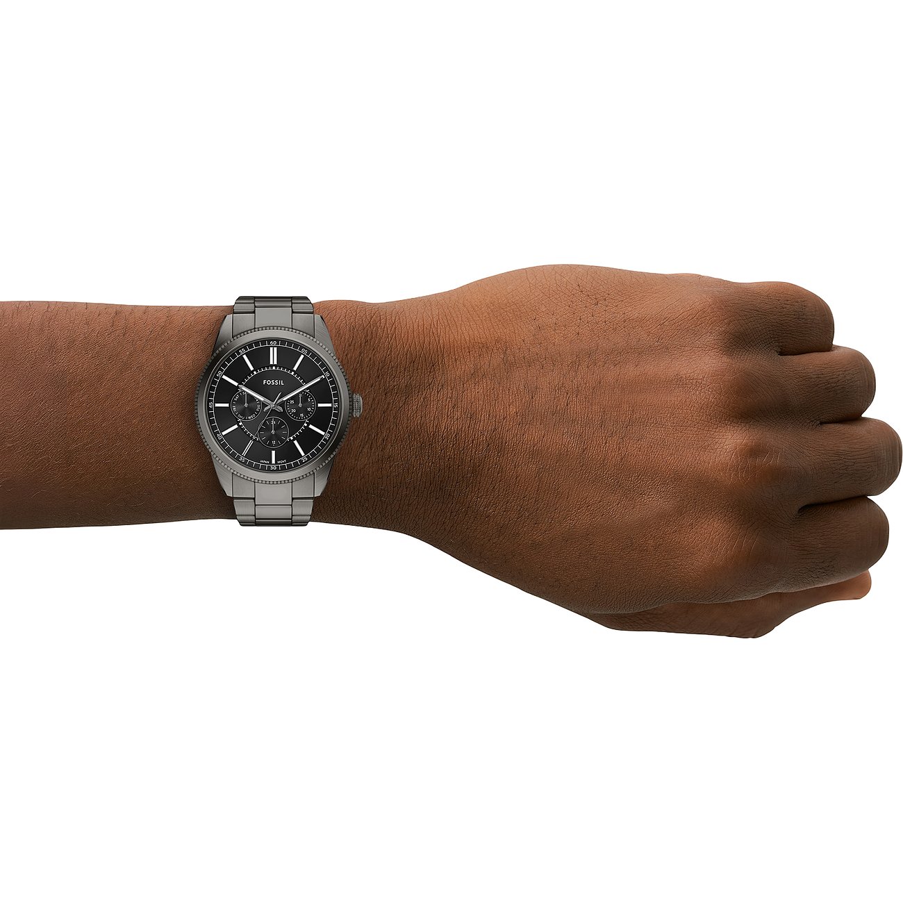 Fossil herrklocka, blått rostfritt stål, mörk urtavla, tre subdials, diskret armband. Sidovy.