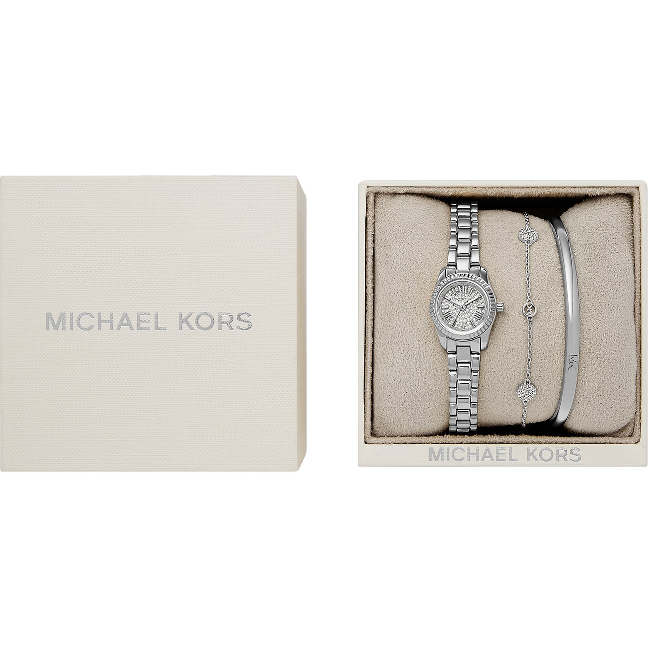 Ett Michael Kors-set: silverfärgad kvartsklocka och två armband i rostfritt stål, i en ljusbrun låda.
