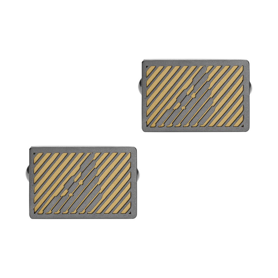 Emporio Armani Ansteckschmuck aus Edelstahl: Zwei rechteckige Manschettenknöpfe in Schwarz mit goldenen Streifen.