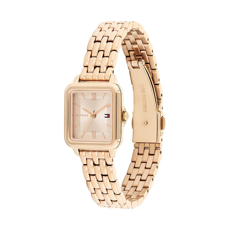 Tommy Hilfiger dameshorloge, goudkleurig edelstaal met vierkante wijzerplaat en schakelarmband, schuin van voren.