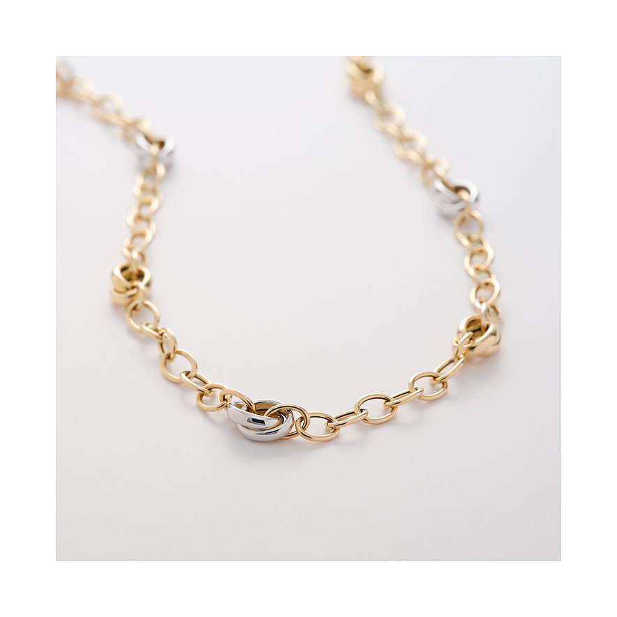 CHRIST Halskette aus Gelbgold und Weißgold mit ineinandergreifenden Ringen, detailreich auf weißem Hintergrund.