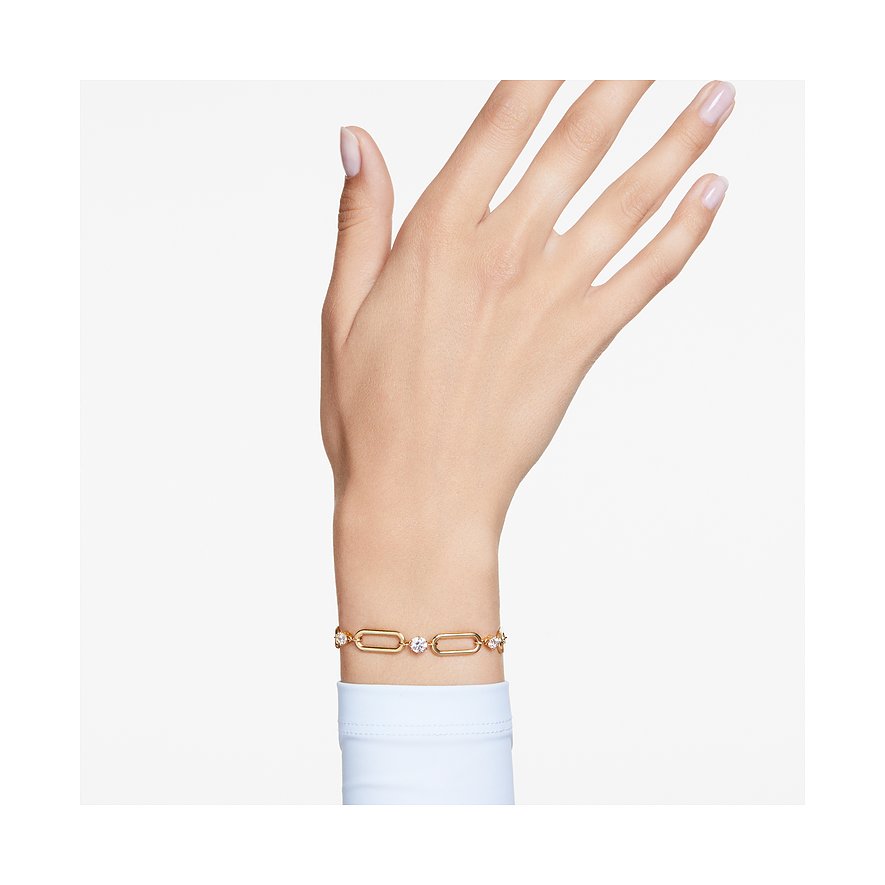 Swarovski polsband, gouden schakelarmband van metaal met fonkelende Swarovski-kristallen.