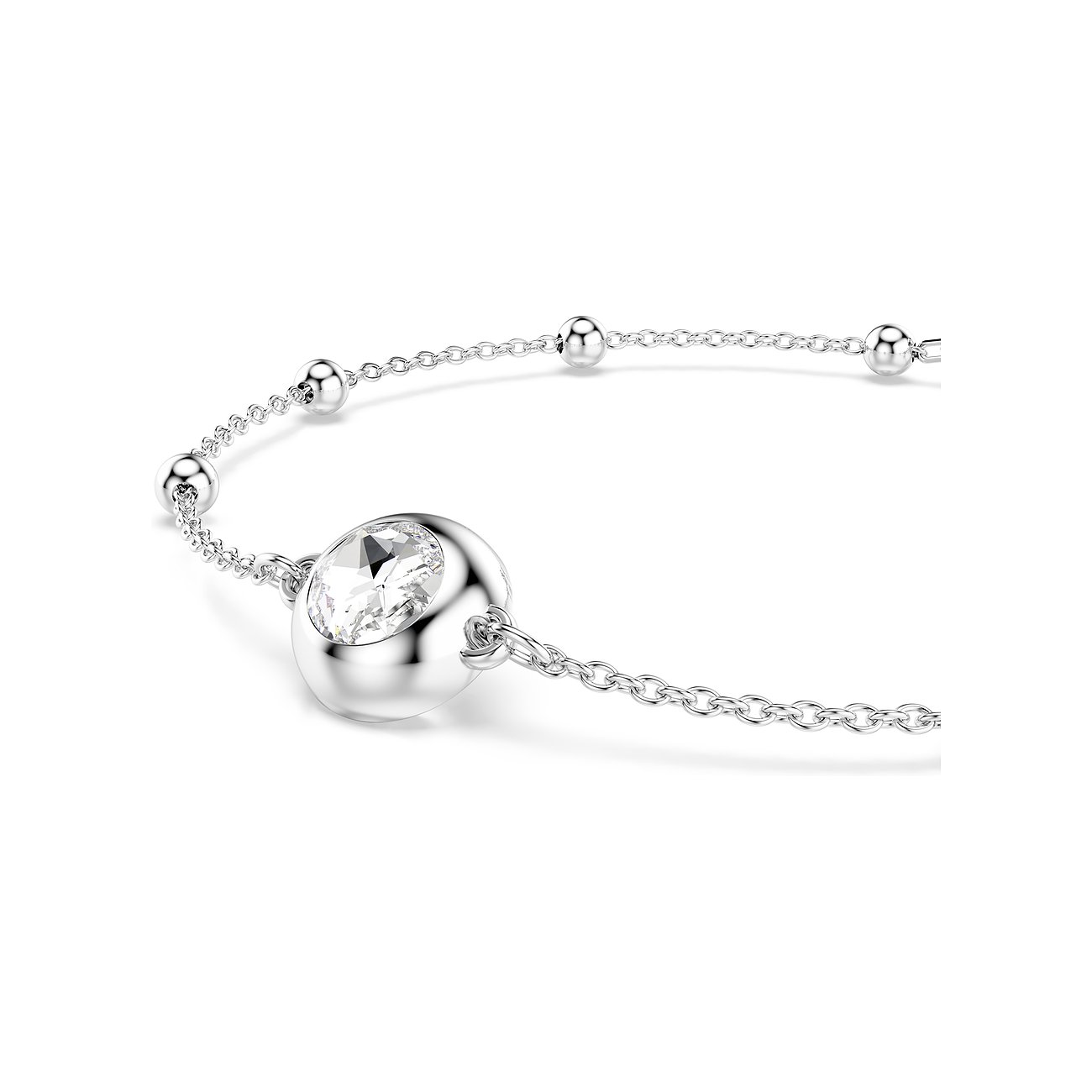 Nahaufnahme eines silberfarbenen Swarovski Armbands aus Metall mit einem einzelnen runden Swarovski Kristall in der Mitte.