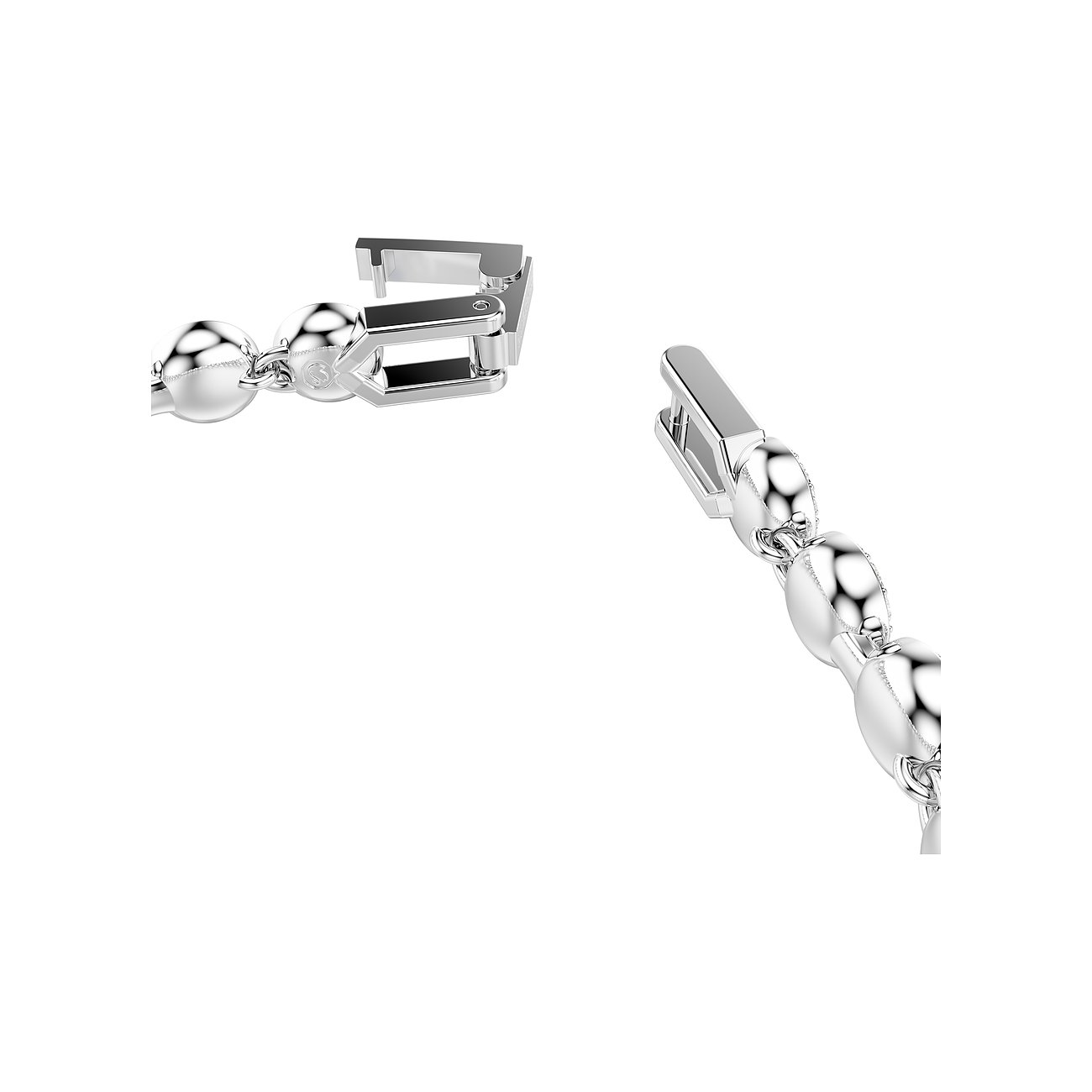 Close-up van de sluiting van een metalen Swarovski armband met sprankelende Swarovski kristallen.