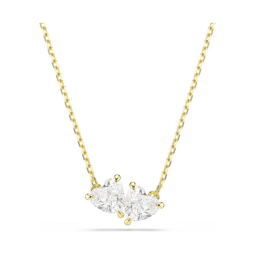 Swarovski ketting van goudkleurig metaal met twee hartvormige Swarovski-kristallen, close-up.