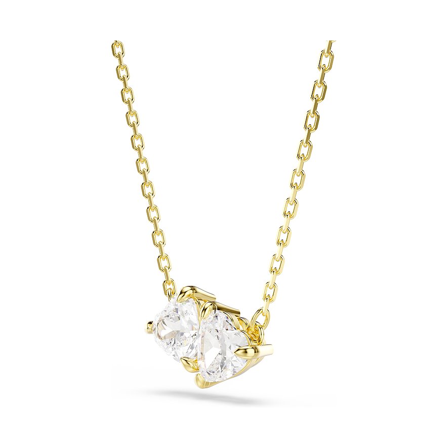 Swarovski halsketting van goudkleurig metaal met twee hartvormige Swarovski-kristallen in een zetting.
