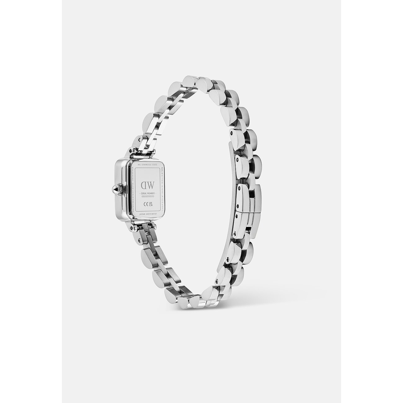 Rückansicht der Daniel Wellington Damenuhr aus Edelstahl, mit rechteckigem Zifferblatt und zartem Gliederarmband.