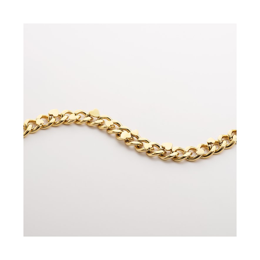 Nærbillede af en gylden Guido Maria Kretschmer halskæde i rustfrit stål, der ligger i bløde bølger.