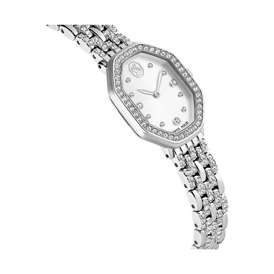 Close-up van een luxueus metalen Swarovski dameshorloge, bezet met vele fonkelende Swarovski-kristallen.