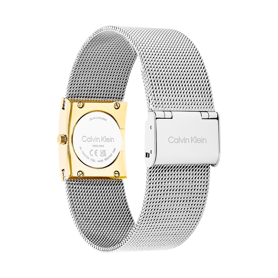 Achterkant van een Calvin Klein dameshorloge van roestvrij staal met gouden kast en zilveren Milanese band.