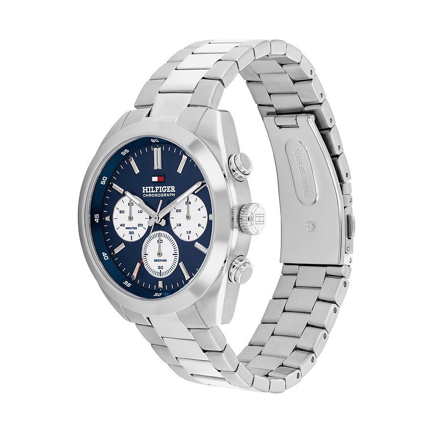Eine Tommy Hilfiger Herrenuhr aus Edelstahl mit marineblauem Zifferblatt und Chronographenfunktion, von oben links.
