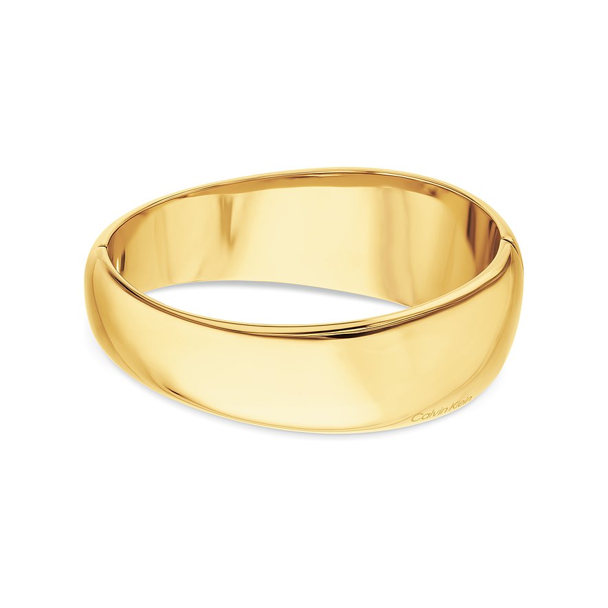 Armreif von Calvin Klein aus glänzendem goldfarbenem Edelstahl, oben links aus der Vogelperspektive gesehen.