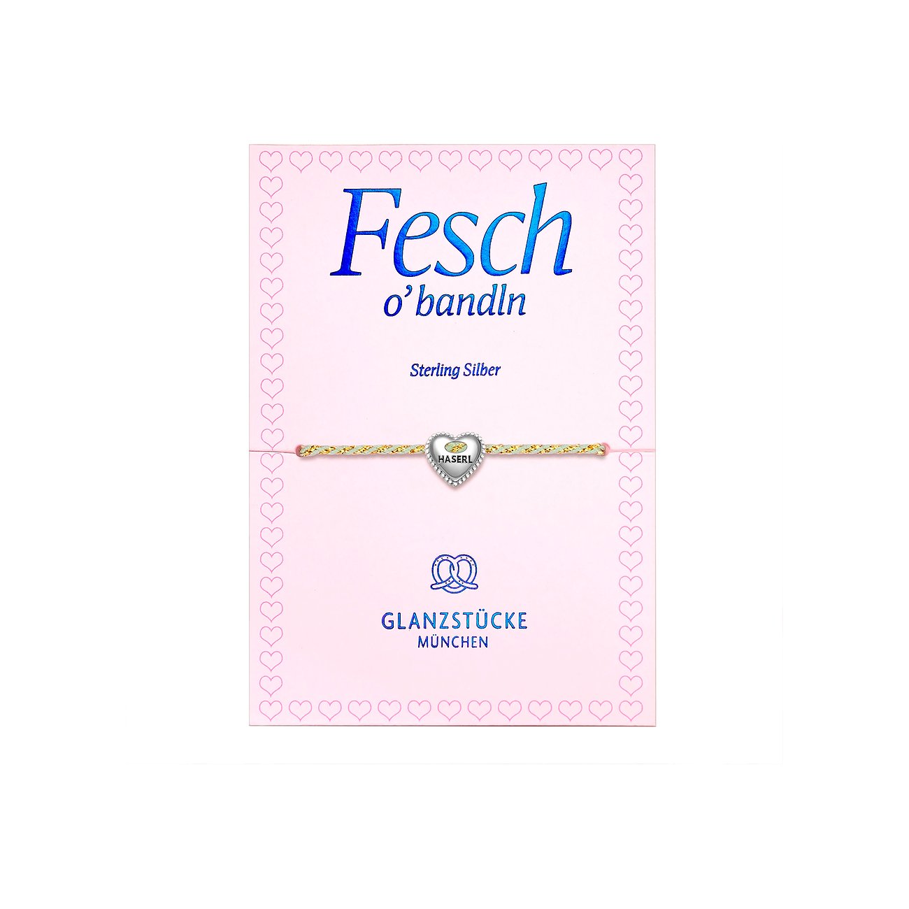 Glanzstücke München Silber Armband auf einem rosafarbenen Kärtchen mit Text „Fesch o´bandIn“ und Herzanhänger.