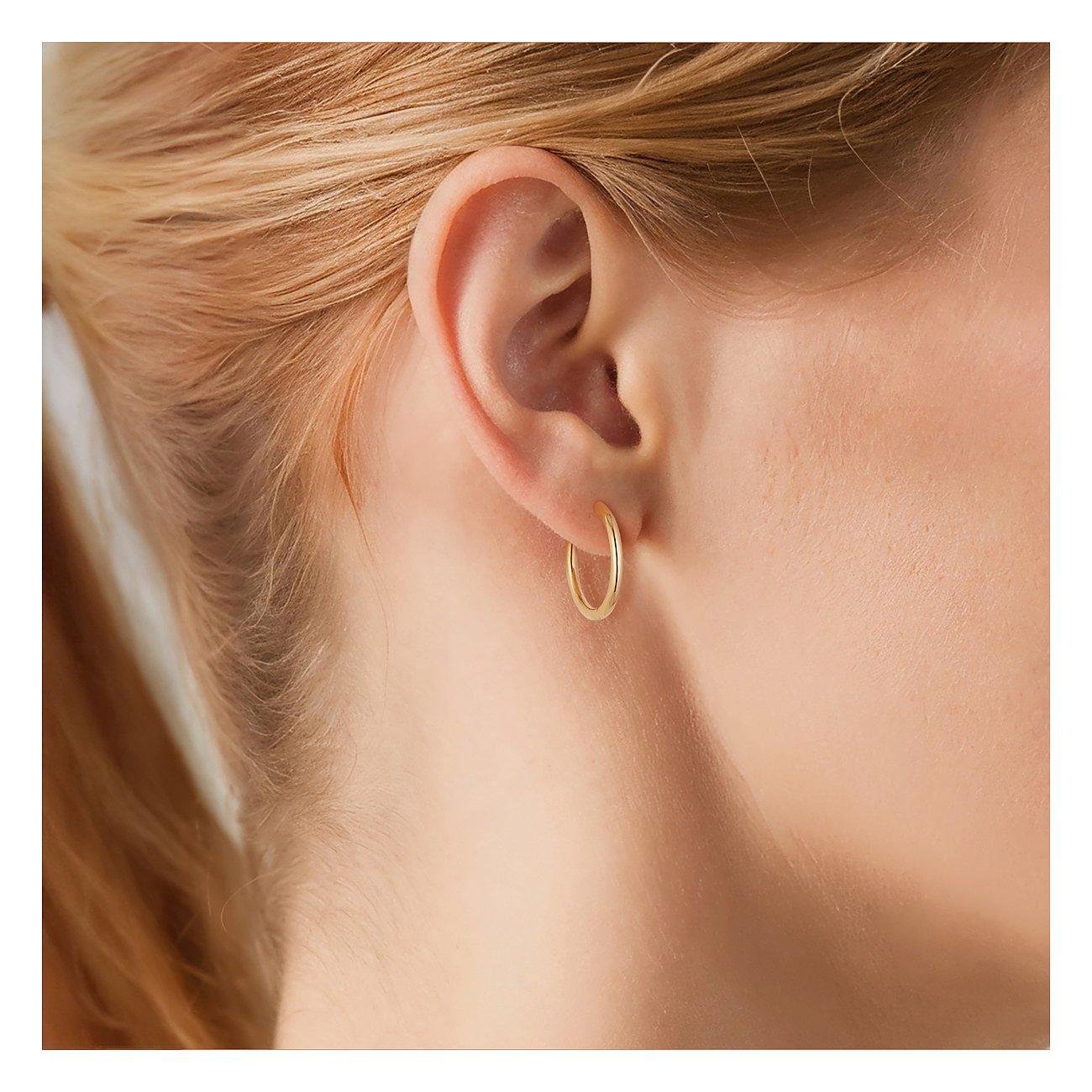 Boucle d'oreille Glanzstücke München brillante en argent 925 doré, créole simple dorée.