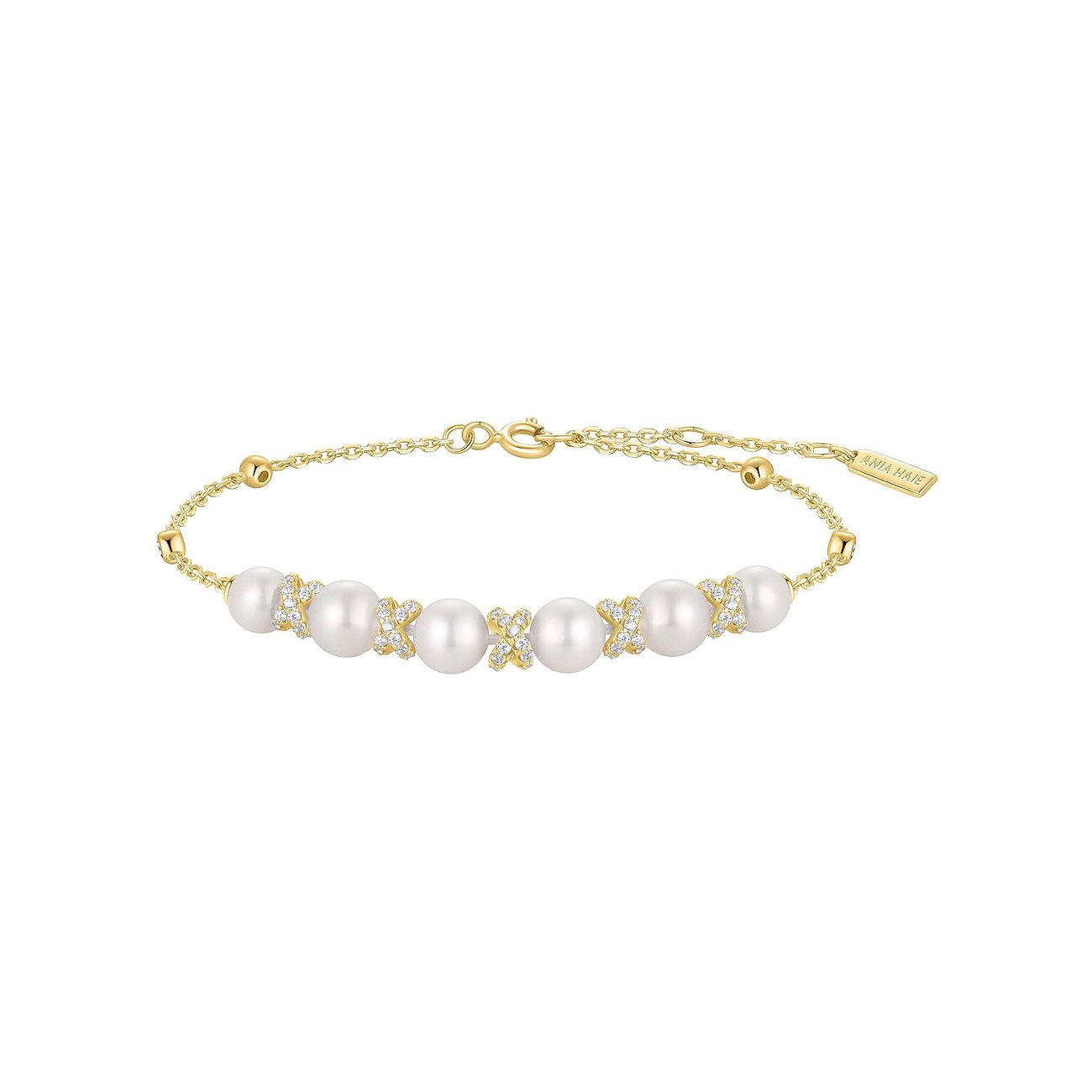 Ania Haie Armband aus vergoldetem Silber mit fünf Perlen und mit Zirkonia besetzten X-förmigen Elementen.