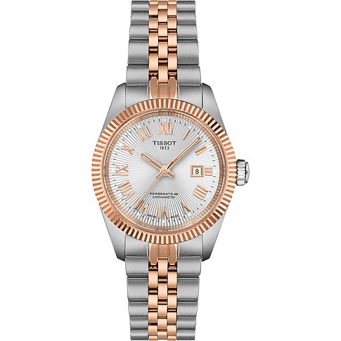 Tissot Damenuhr aus Edelstahl mit silber- und roségoldfarbenem Armband, geriffelter Lünette und silbernem Zifferblatt.