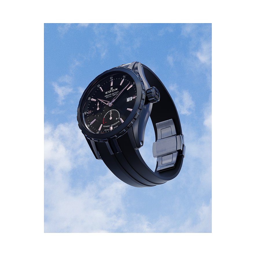 Die Edox Herrenuhr aus schwarzem Edelstahl und Aluminium, mit schwarzem Zifferblatt, schwebt vor blauem Himmel.