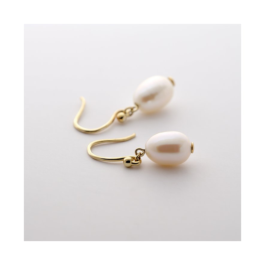 Boucles d'oreilles CHRIST en or jaune avec perles en forme de goutte, vue du dessus sur une surface blanche.
