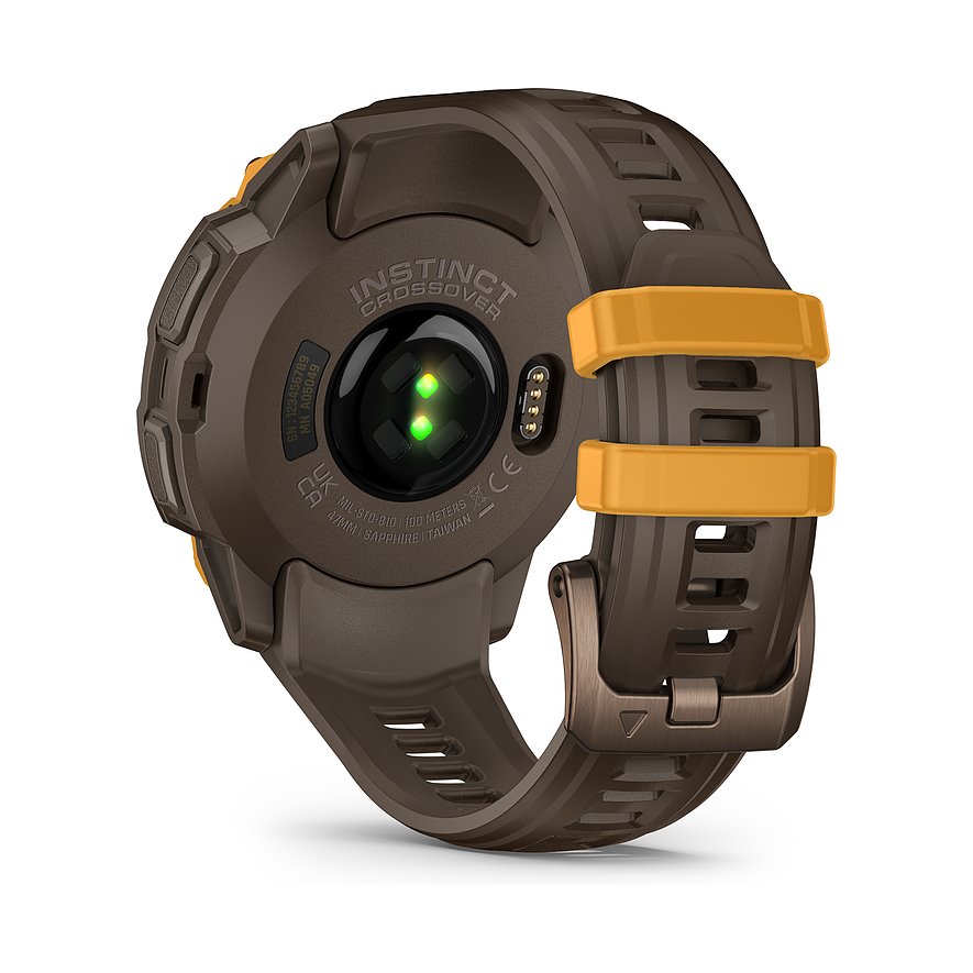 Rückansicht der Garmin Instinct Crossover Smartwatch aus braunem Kunststoff mit grünen Herzfrequenzsensoren und braunem Armband.